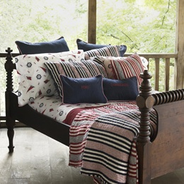 wood bed frame with country bedding